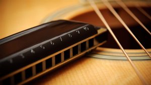 guitar_strings_acoustic_harmonica-Music_HD_Wallpaper_1366x768